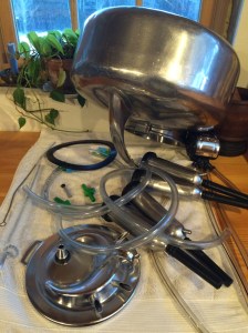 The cows are milked by hand using this equipment.